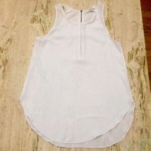 Gentle used Wilfred Blouse XXS.Sleeveless Zipper in the back and round neck.